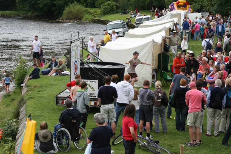 The Village Green, on the banks of the river Wharfe - a hive of activity on Sports Day